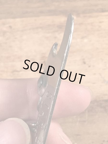 スタービールの折り畳みのコークスクリューが付いたビンテージ栓抜き