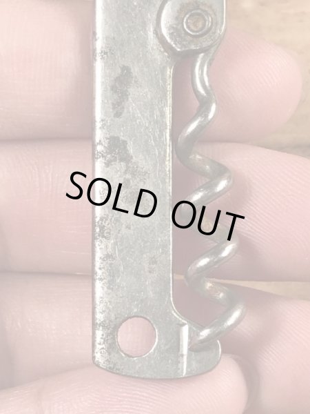 企業物の折り畳みのコークスクリューが付いたヴィンテージボトルオープナー