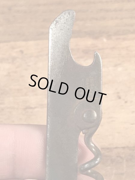 企業物の折り畳みのコークスクリューが付いたビンテージ栓抜き