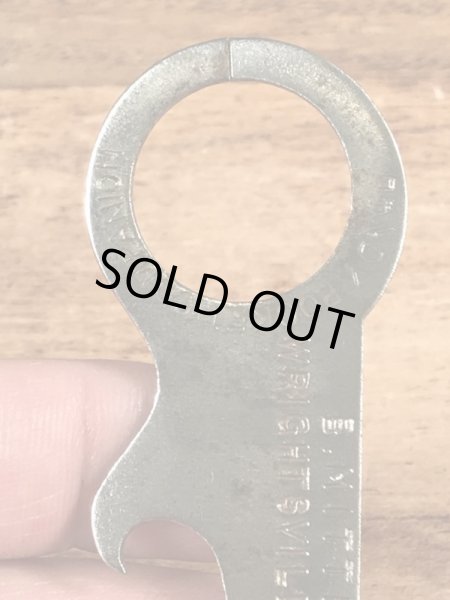 アンティークのポケットツールが付いたビンテージ栓抜き