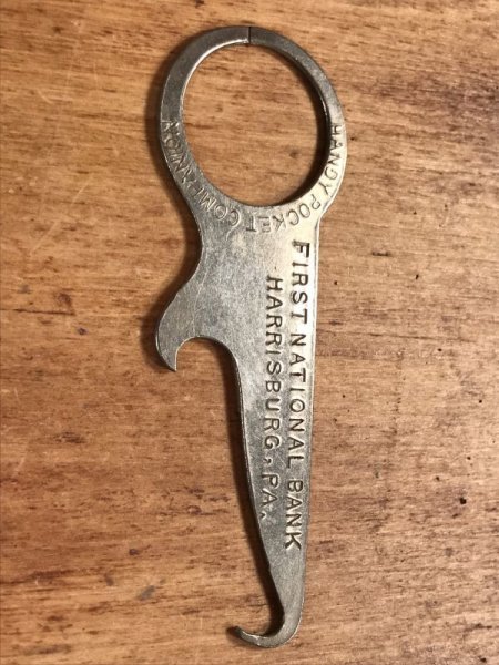 アンティークのポケットツールが付いたビンテージ栓抜き