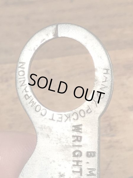 アンティークのポケットツールが付いたビンテージ栓抜き