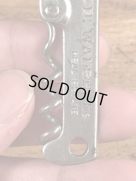 企業物の折り畳みのコークスクリューが付いたヴィンテージボトルオープナー