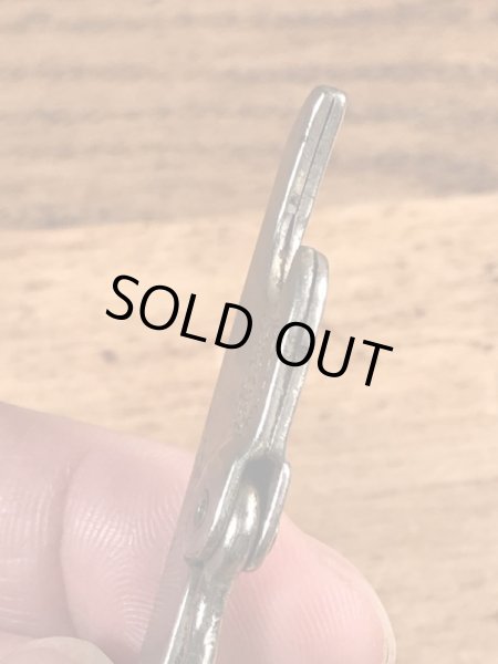 企業物の折り畳みのコークスクリューが付いたビンテージ栓抜き