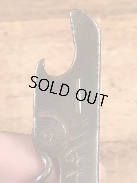 企業物の折り畳みのコークスクリューが付いたビンテージ栓抜き