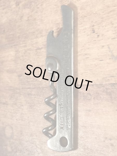 企業物の折り畳みのコークスクリューが付いたヴィンテージボトルオープナー