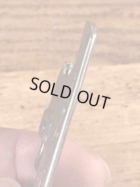 企業物の折り畳みのコークスクリューが付いたビンテージ栓抜き