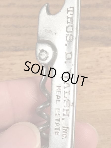 企業物の折り畳みのコークスクリューが付いたビンテージ栓抜き