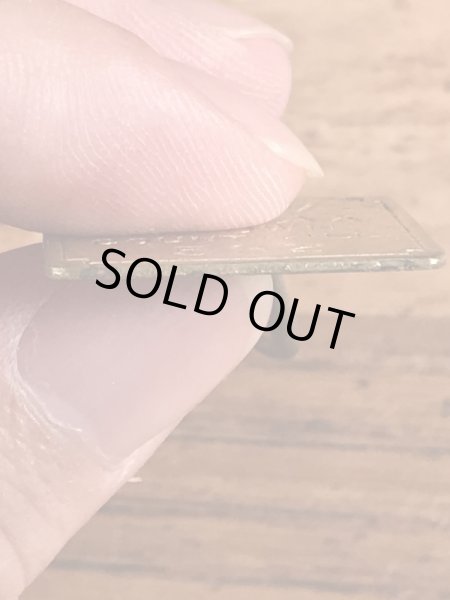 Dog Taxの真鍮製のビンテージドッグタグ