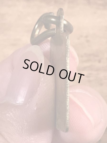 Dog Taxの真鍮製のビンテージドッグタグ