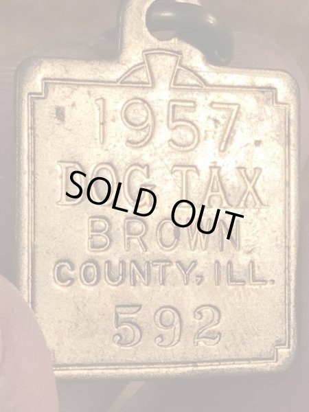 Dog Taxの真鍮製のビンテージドッグタグ