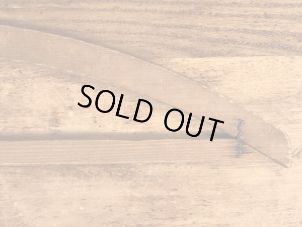 アメリカのアドバタイジング物のアンティークのウッドハンガー