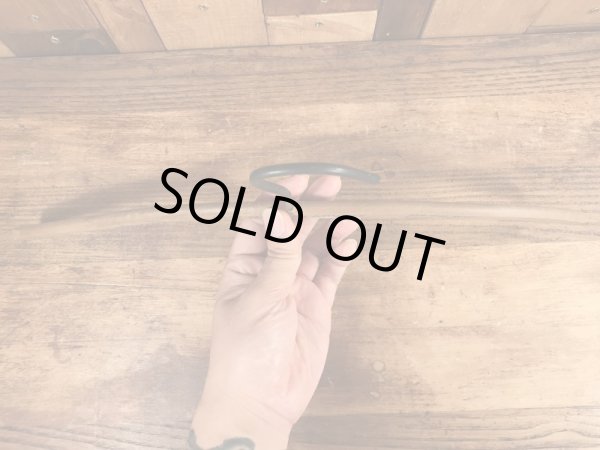 アメリカの企業物のアンティークのウッドハンガー