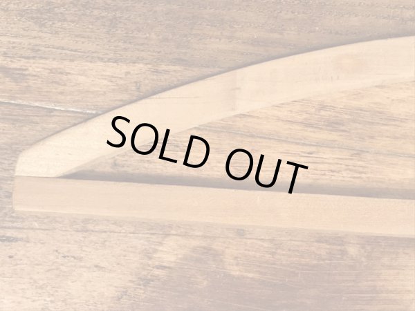 アメリカの企業物のアンティークのウッドハンガー