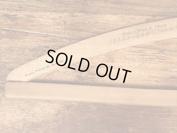 アメリカの企業物のアンティークのウッドハンガー