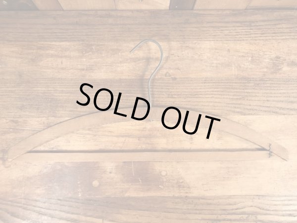 アメリカのアドバタイジング物のアンティークのウッドハンガー