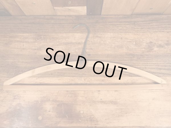 アメリカの企業物のアンティークのウッドハンガー