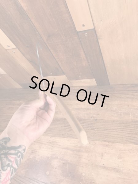 アメリカの企業物のアンティークのウッドハンガー