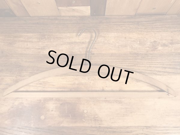 アメリカのアドバタイジング物のアンティークのウッドハンガー