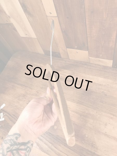 アメリカのアドバタイジング物のアンティークのウッドハンガー