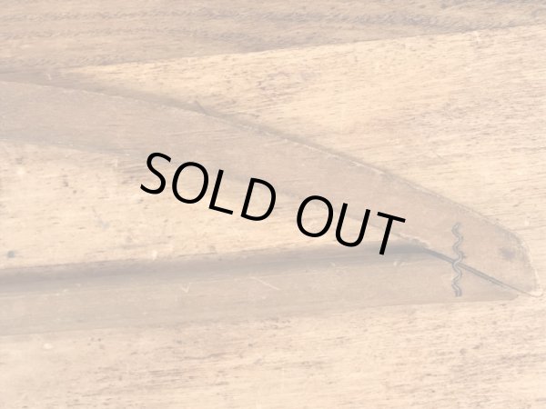 アメリカの企業物のアンティークのウッドハンガー