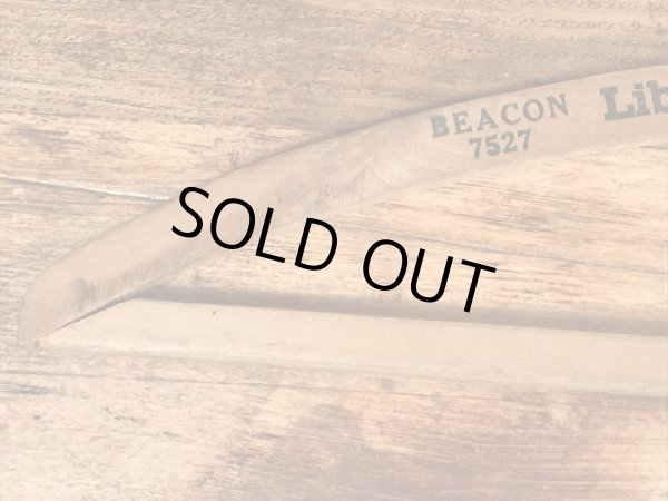 アメリカのアドバタイジング物のアンティークのウッドハンガー