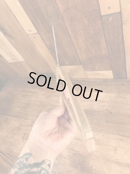 アメリカの企業物のアンティークのウッドハンガー