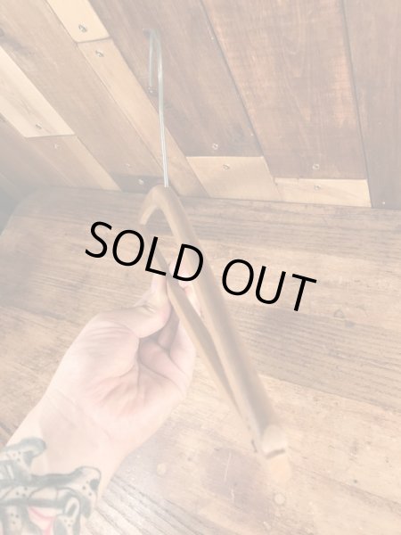 アメリカのアドバタイジング物のアンティークのウッドハンガー