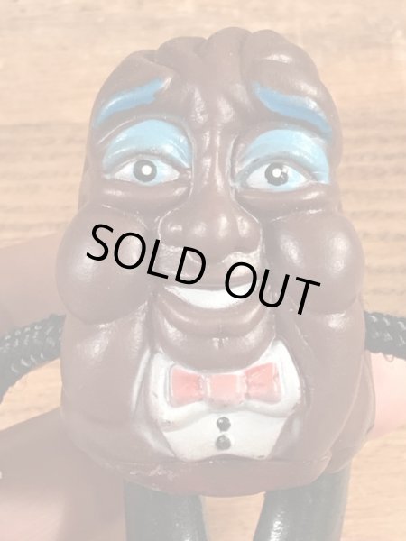 カリフォルニアレーズンに似たビニール製のビンテージドール