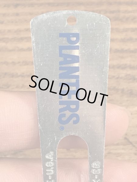 企業キャラクターのミスターピーナッツのビンテージディボットツール