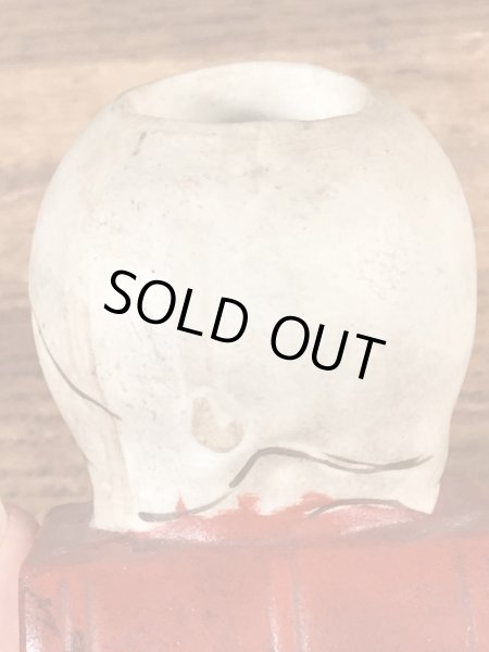 スカルオンブックの顎揺れするビンテージマッチホルダー