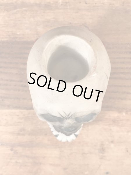 スカルオンブックの顎揺れするビンテージマッチホルダー