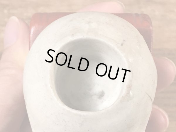 スカルオンブックの顎揺れするビンテージマッチホルダー