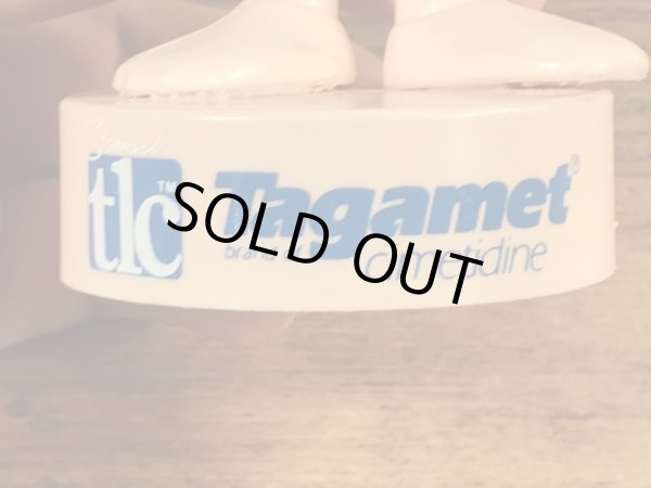 企業キャラクターのタガメットのビンテージPVCフィギュア