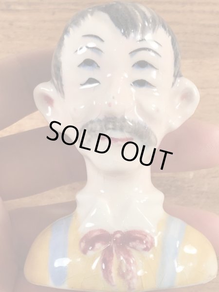 酔っ払いの四つ目のビンテージ塩コショウ入れ