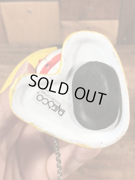 檻に入った囚人の鳥のヴィンテージコインバンクドール