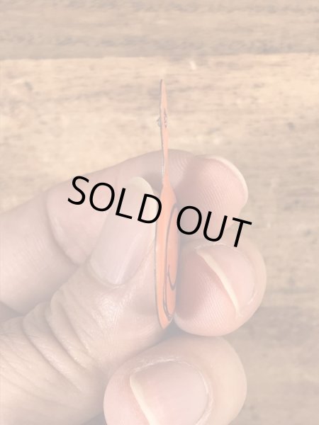 スマイルの顔が描かれたビンテージタブバッジ