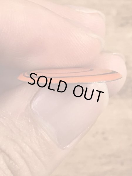 スマイルの顔が描かれたヴィンテージタブバッチ