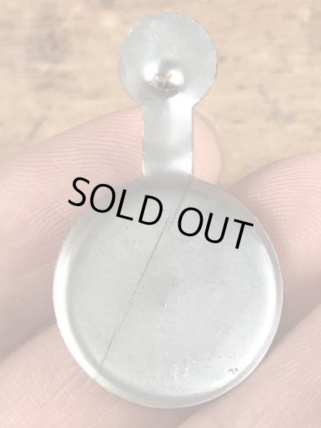 スマイルの顔が描かれたヴィンテージタブバッチ