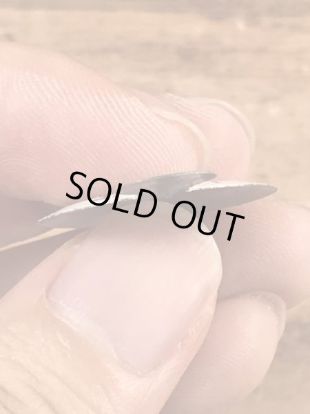 スマイルの顔が描かれたビンテージタブバッジ