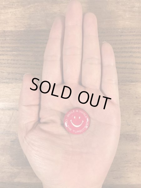 スマイルの顔とメッセージが書かれたビンテージ缶バッジ