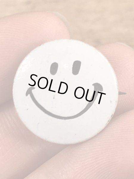 スマイルの顔が描かれたビンテージ缶バッジ