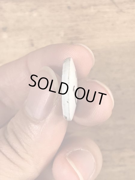 スマイルの顔が描かれたビンテージ缶バッジ