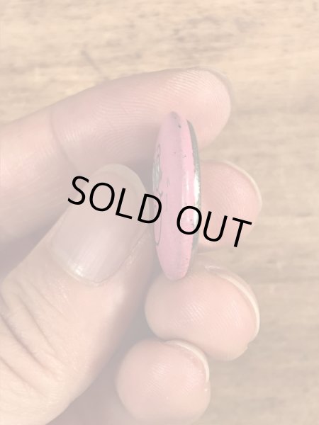 目が$マークになったスマイルのビンテージ缶バッジ