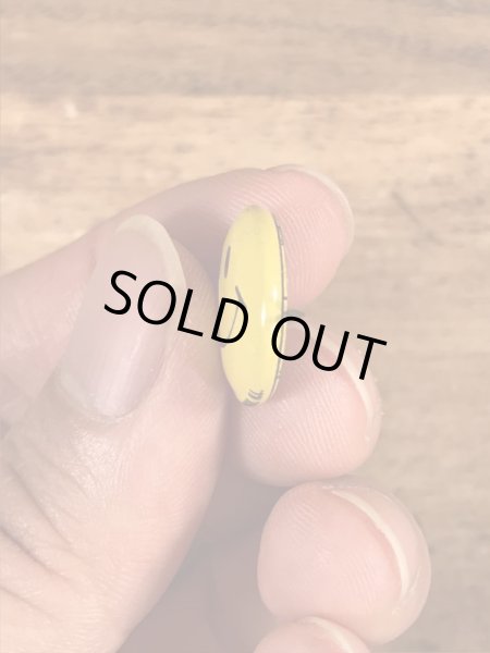 スマイルの顔が描かれたビンテージ缶バッジ