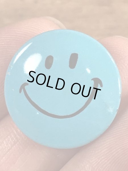 スマイルの顔が描かれたビンテージ缶バッジ