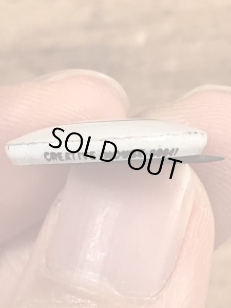 スマイルフェイスのブリキ製のヴィンテージ缶バッチ