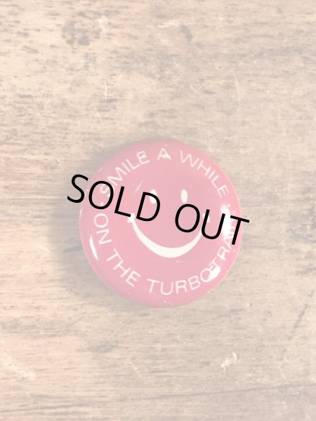 スマイルの顔とメッセージが書かれたビンテージ缶バッジ