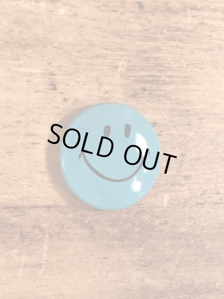 スマイルの顔が描かれたビンテージ缶バッジ