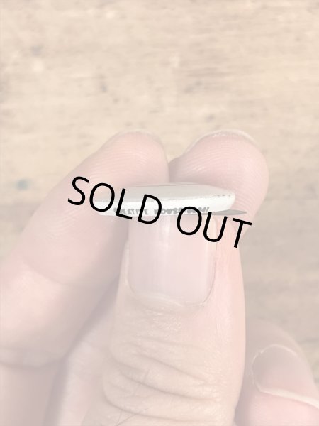 スマイルフェイスのブリキ製のヴィンテージ缶バッチ